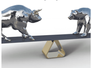 silver bull and bear facing each other on a balance scale